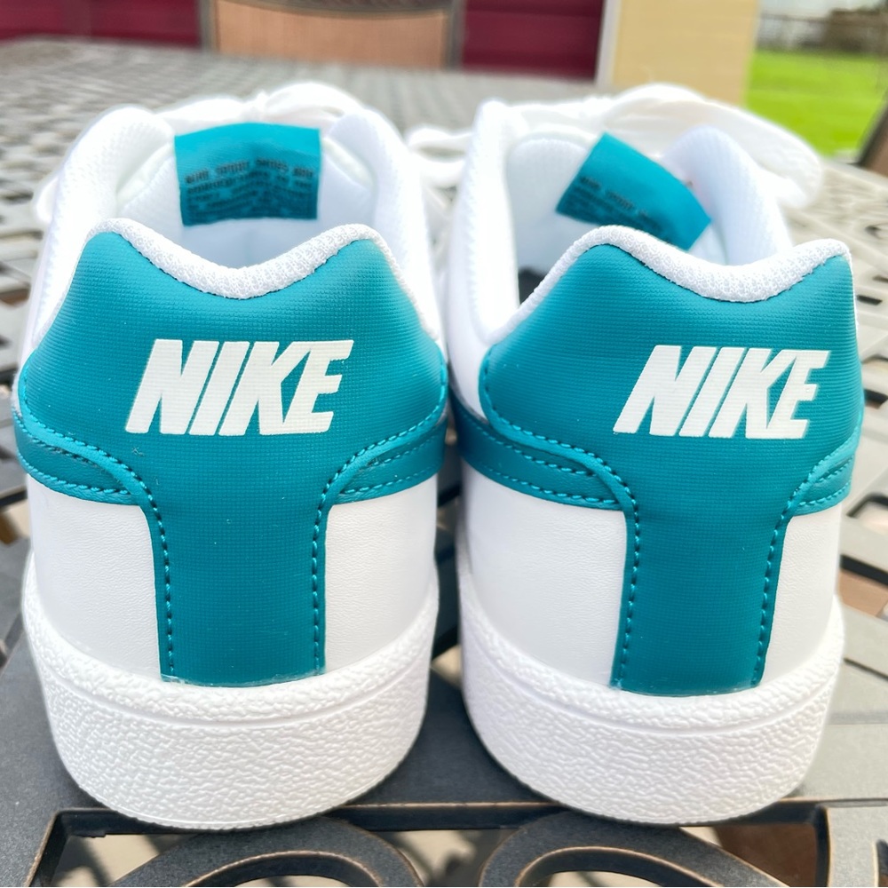 Women’s pre-owned Nike Court Royale size 9.5. Only worn a couple of times.